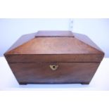 A mahogany sarcophagus formed tea caddy (slight damage to one corner)