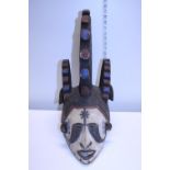 A antique hand carved unusual tribal mask