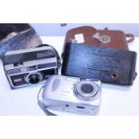 Three vintage cameras
