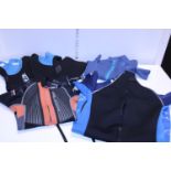 A selection of wet/dry suits various sizes