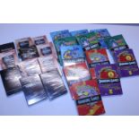 A selection of new sealed Guinness playing cards and other games