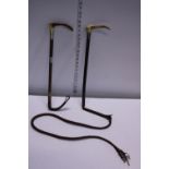 Two vintage riding crops one with silver mount