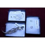 Two Sterling silver brooches and a pair of 925 silver earrings