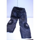 A pair of leather 'Frank Thomas' motorbike trousers size 32