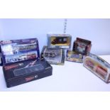 A selection of boxed die-cast models and a thunderbirds chess set