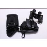 Three pairs of assorted binoculars