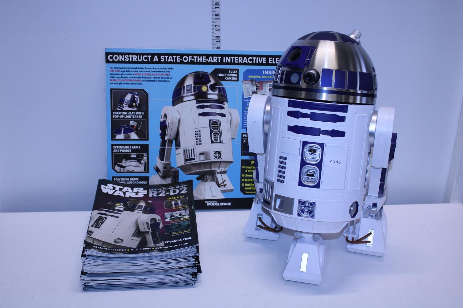 A Deagostini build your own Star Wars R2-D2 complete with magazines