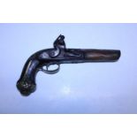 A antique 19th century Ottoman Empire smaller flintlock pistol with a Damascus silvered barrel