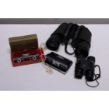 Three assorted pairs of binoculars