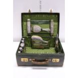 A hallmarked silver mounted Gentlemen's vanity case retailed by Harrods. (some dents to silver