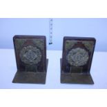 A pair of unusual antique Chinese wooden and brass bookends
