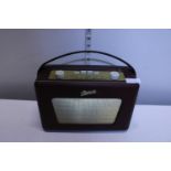 A vintage Robert's radio with charger