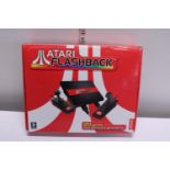 A Atari flashback retro games console with 20 classic games from 70's & 80's