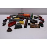 A box of vintage Hornby and Triang 00 gauge accessories