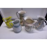 Five assorted ceramic jugs, shipping unavailable