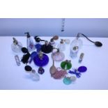 A job lot of assorted scent bottles and atomisers