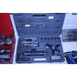 A boxed professional six way multi purpose hydraulic gear puller