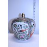 A Oriental ceramic hand painted lidded pot