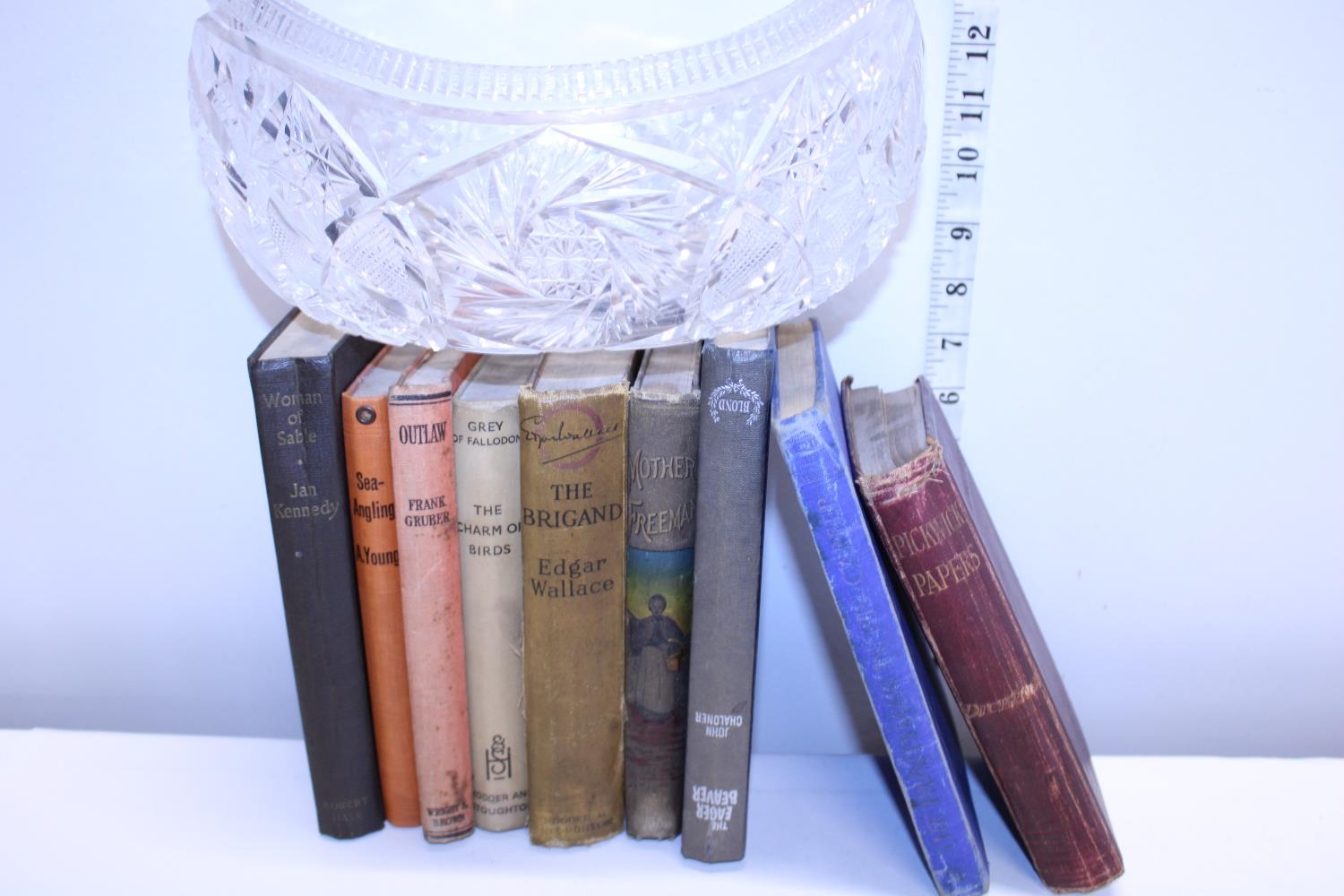 A selection of antique/vintage books and a cut glass crystal bowl