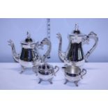 Two silver plated coffee pots, sugar bowl and cream jug