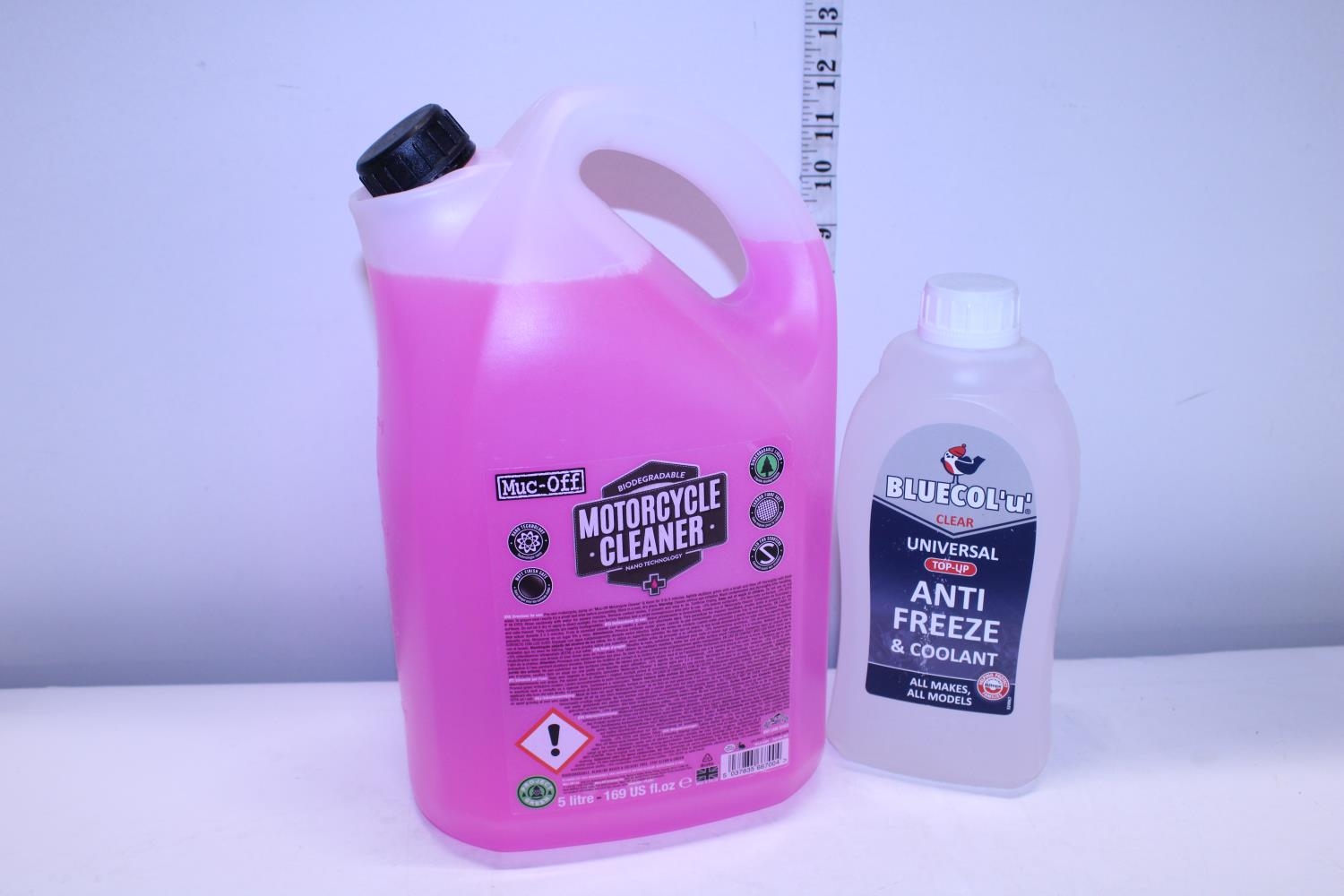 A new sealed bottle of motorcycle cleaner and a bottle of anti-freeze, shipping unavailable