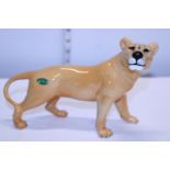 A large Beswick lioness