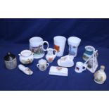 A job lot of assorted crested ware