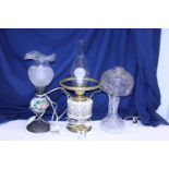 Three assorted table lamps including a glass style hurricane lamp, shipping unavailable