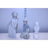Two Lladro figurines and a Royal Doulton figure