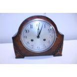 A 1930's oak cased mantle clock