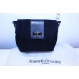 A ladies Russell and Bromley handbag and dust cover