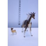 A large Beswick giraffe and deer (both with repairs)