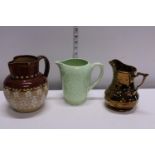 Three assorted antique jugs including Royal Doulton (has nibbles) and Wade
