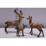 A family of three Beswick deer