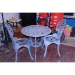 A wrought iron table and two chairs bistro set, Shipping unavailable