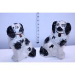 Two Victorian flat back Staffordshire spaniels