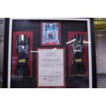 A framed pair of Lewis Hamilton OMP race gloves 2007 with COA