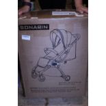 A new boxed Sonarin baby stroller (unchecked)