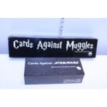 A box set of Cards Against Muggles and Cards Against Starwars