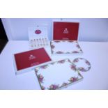 A selection of Royal Albert Old Country Roses placemats and set of forks