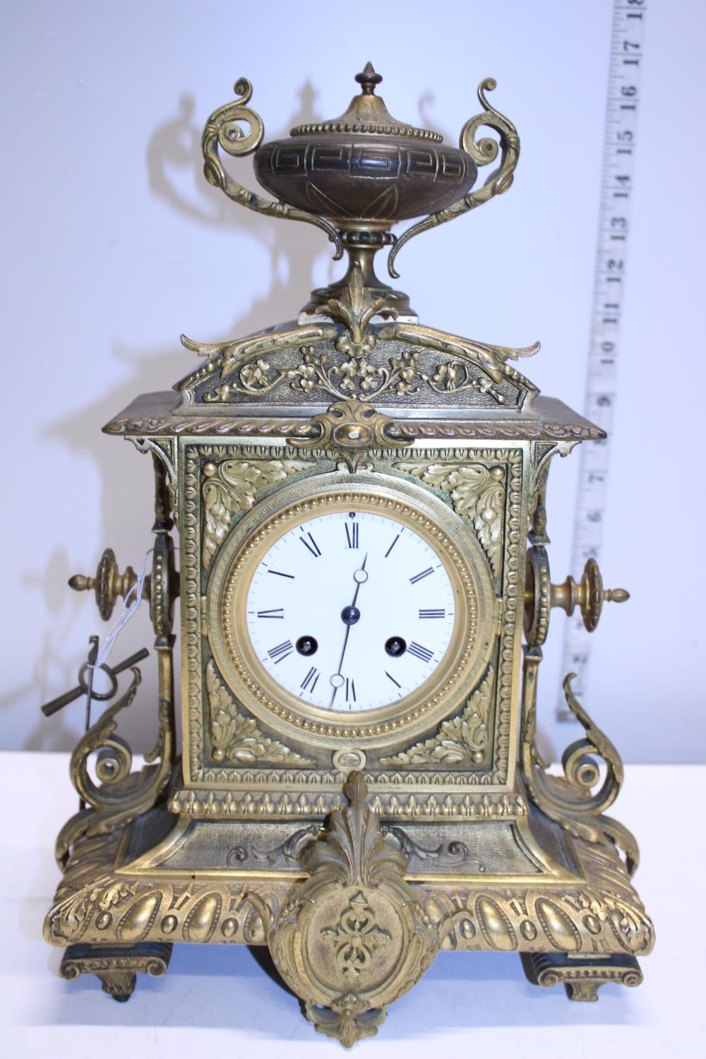A heavy gilt brass mantle clock with enamel face, with key and pendulum. Shipping unavailable - Image 2 of 4