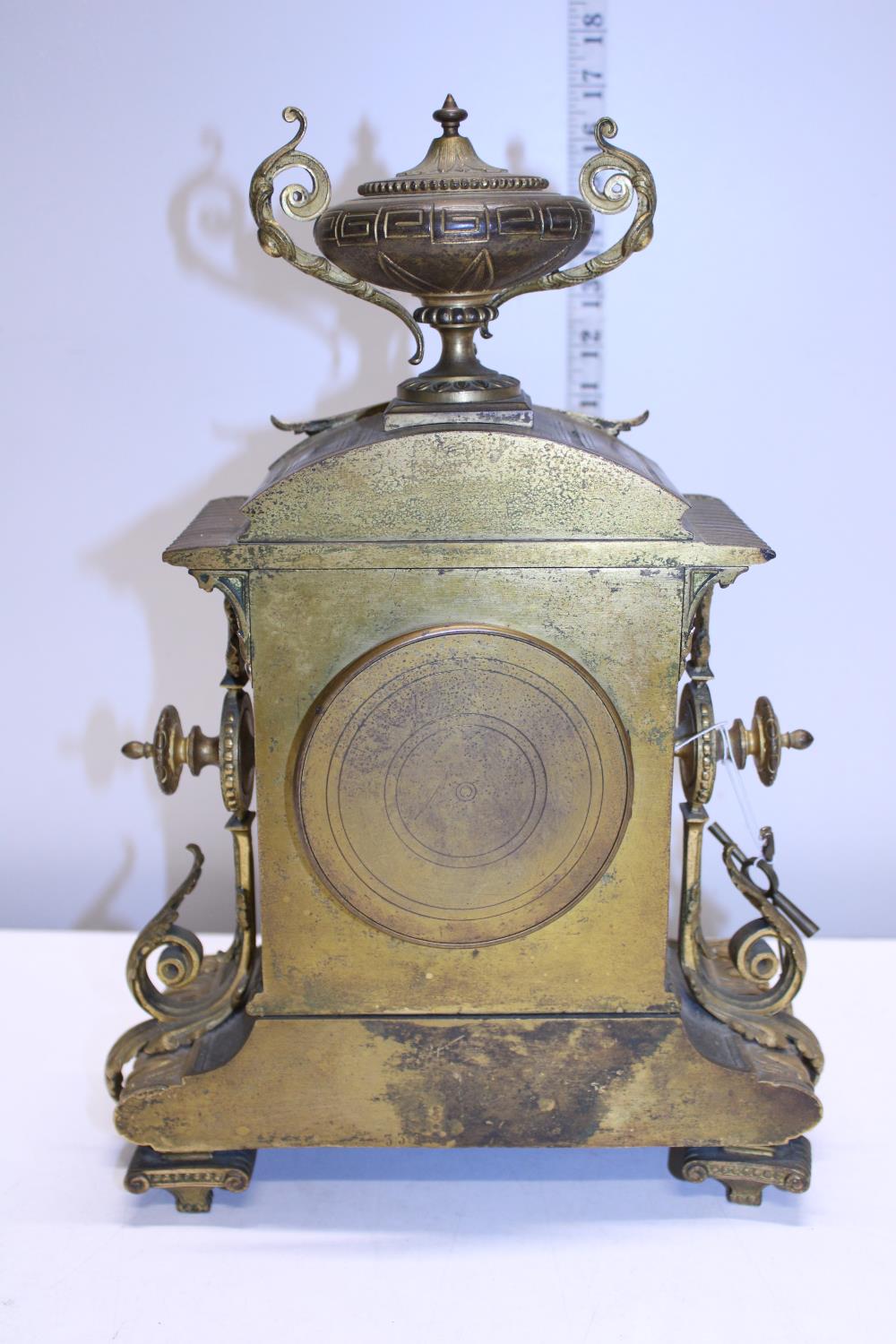 A heavy gilt brass mantle clock with enamel face, with key and pendulum. Shipping unavailable - Image 4 of 4