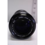 A Sigma zoom 1:4 5.6 f=60 x 200mm macro lens