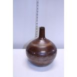 A nice example of a mid Victorian stone glazed wine flagon with a primitive hand engraving design to