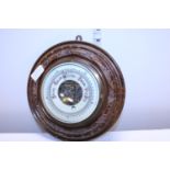 A oak cased vintage barometer