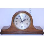 A vintage wooden cased mantle clock by Enfield working with key, shipping unavailable