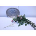 A silver plated tray with ceramic roses and other