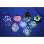 A job lot of assorted paperweights
