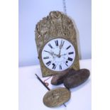 A vintage brass and enamelled grandfather clock movement with pendulum and weights. Shipping