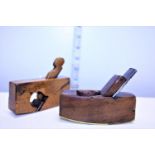 A small boxwood plane and another lovely brass bottomed convex coffin plane, joiners name Trower